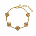 Vera Luce Gold Stainless Steel Clover Charm Bracelet with Cubic Zirconia