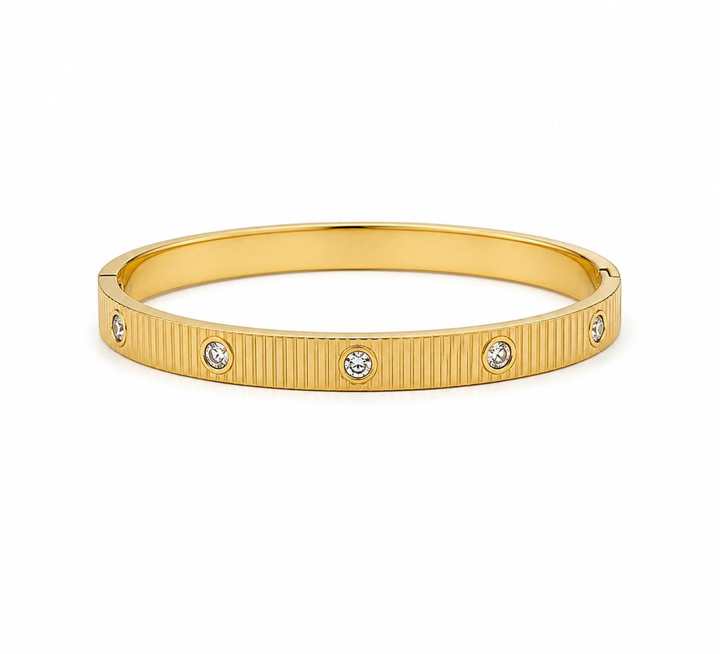Vera Luce Ribbed Gold Stainless Steel Bracelet with CZ Embellishment