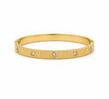 Vera Luce Ribbed Gold Stainless Steel Bracelet with CZ Embellishment