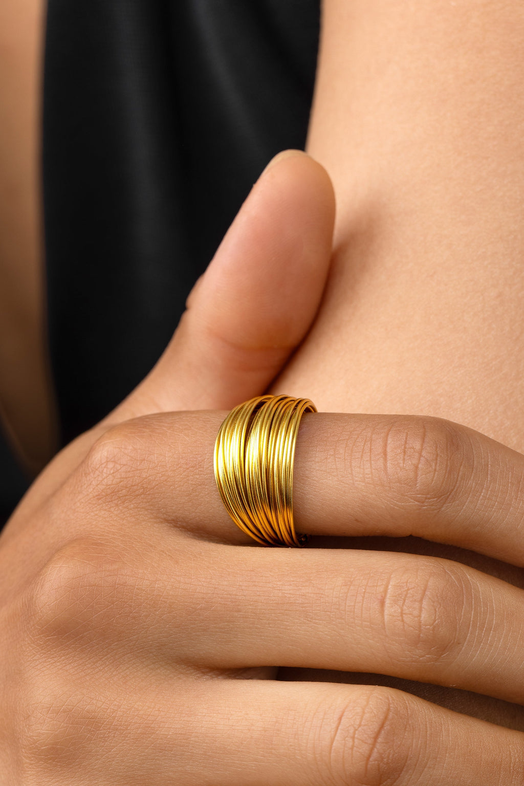 MULTI-STRAND RING