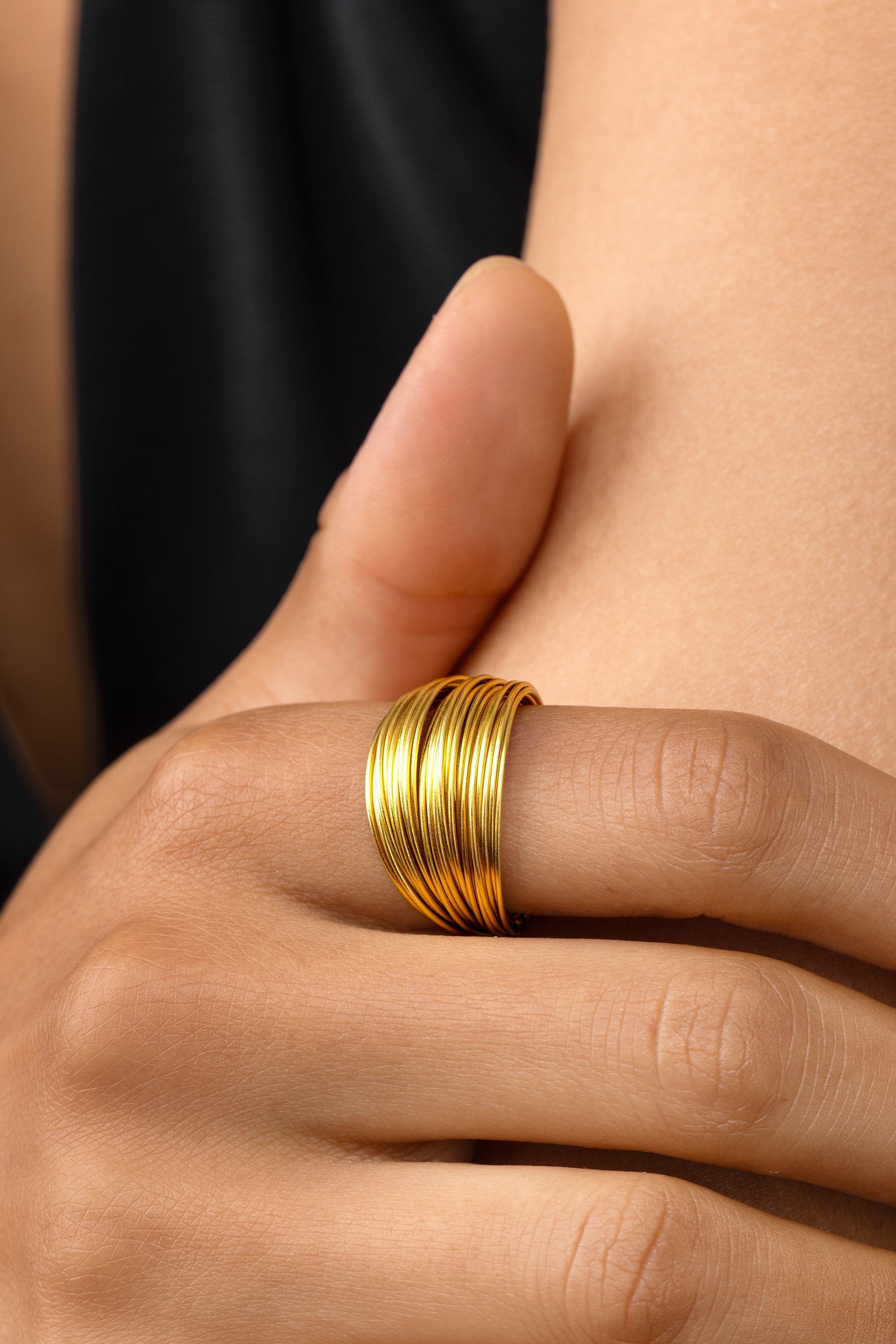 MULTI-STRAND RING
