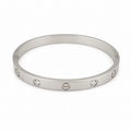 CRYSTAL ACCENT ICONIC SILVER BANGLE BRACELET