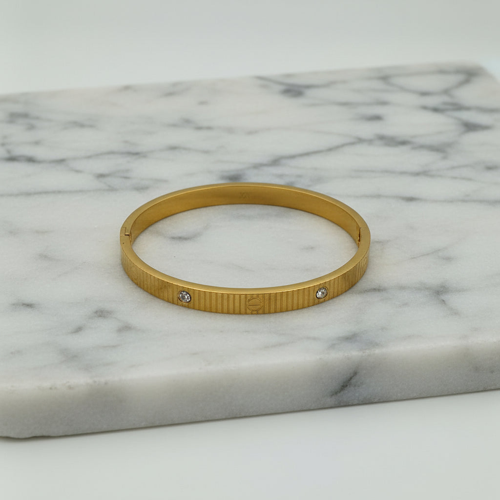 RIBBED GOLD SCREW AND CRYSTAL BANGLE BRACELET